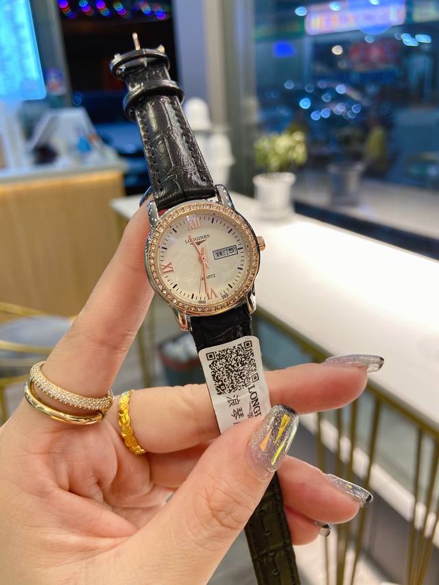 皮带 浪琴 Longines 索依米亚 进口日本石英机芯 小牛皮表带。 传统三针设计 日历星期显示 尺寸：女款30Mm 实物实拍，欢迎转发