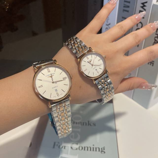 白壳 玫 钢带加20 实物拍摄 品牌： 浪琴-Longines 类型：情侣对表 表壳：316精钢 做工优质 表带：进口小牛皮 316精钢 两种可选 机芯：进口石