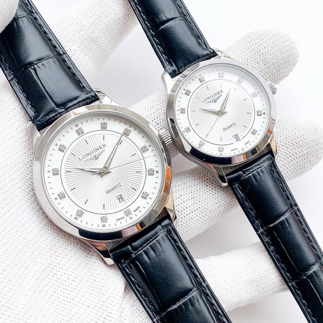 白壳 金壳 钢带20 品牌：浪琴-Longines 类型：情侣腕表 壳套：顶级版316精钢l 表带：进口小牛皮表带 316L精钢表带 机芯：进口石英机芯 镜面：