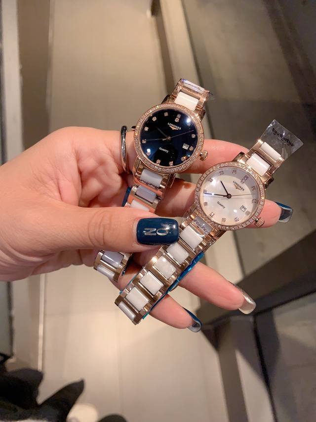 白 金 钻30 珍珠贝壳面 浪琴-Longines. 最新气质女表 搭载原装进口石英机芯，珍珠贝表盘，水晶镶钻精致雅典，闪亮而不单调，316精钢表壳 ，尺寸30