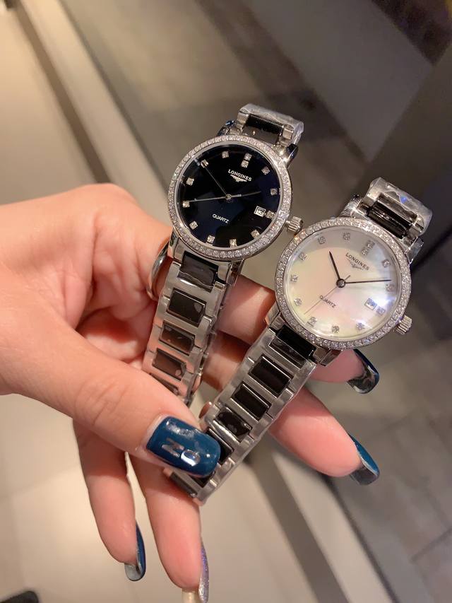 白 金 钻30 珍珠贝壳面 浪琴-Longines. 最新气质女表 搭载原装进口石英机芯，珍珠贝表盘，水晶镶钻精致雅典，闪亮而不单调，316精钢表壳 ，尺寸30