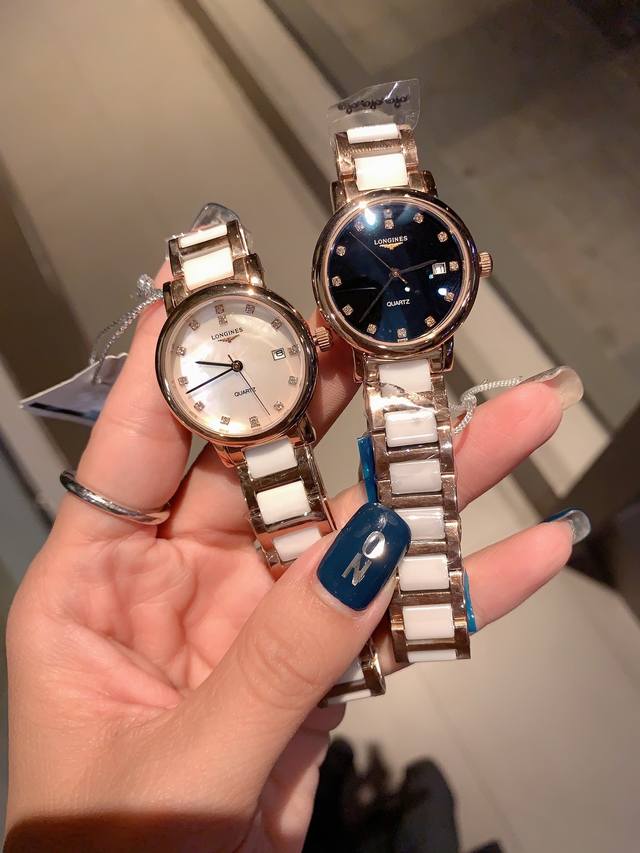 白 金 钻30 珍珠贝壳面 浪琴-Longines. 最新气质女表 搭载原装进口石英机芯，珍珠贝表盘，水晶镶钻精致雅典，闪亮而不单调，316精钢表壳 ，尺寸30