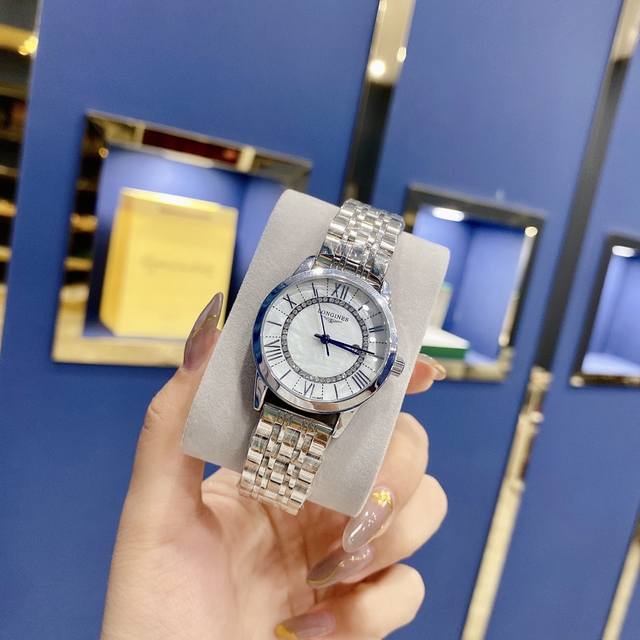 Longines 系列腕表 简约时尚、最佳单品. 316精钢材质，进口石英机芯，纯天然珍珠贝母表盘，搭配经典三针设计、 3字位日历星期显示，双卜拱形抗耐磨玻璃，