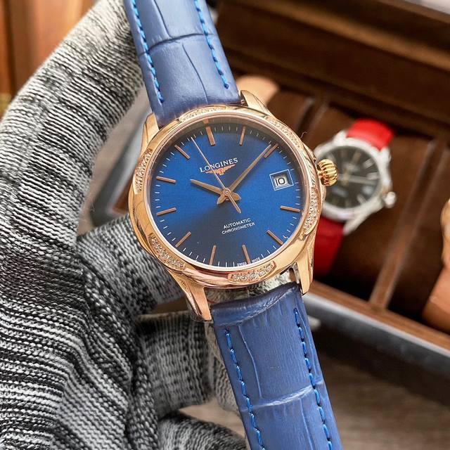 特价 浪琴－Longines 新款女装机械腕表 进口西铁城8215机芯 316L精钢表壳 真牛皮表带 原装扣 蓝宝石玻璃镜面 直径35Mm 厚度11Mm 生活节