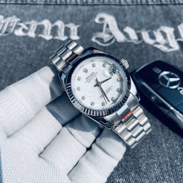 金+20钻+20 品牌：Rolex劳力士新款女款 系列：日志型 机芯：顶级进口全自动机械机芯 壳套: 采用316精钢壳套 镜面: 矿物质水晶防磨防刮镜面 尺寸：