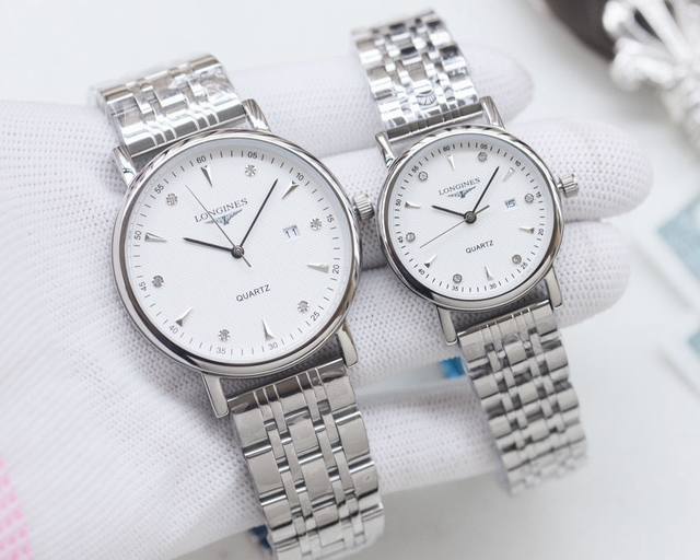 金壳+20钢带20 品牌：浪琴-Longines 类型：情侣腕表 壳套：顶级版316精钢L 表带：进口小牛皮表带 316L精钢表带 机芯：进口石英机芯 镜面：矿