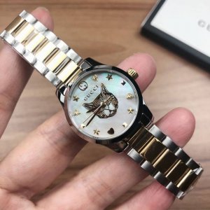 原盒:30 古驰g-Timeless 系列，表径27Mm，白色珍珠贝母表盘饰以品牌标志性动物图案，不绣钢间电pvd表带表壳，生活防水30M，现货
