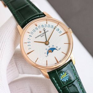 白 金 全新升级版Vacheron Constantin 经典之美品鉴江诗丹顿传承逆跳日历款腕表 型号40 00R-B329。盘面设计独树一帜，功能简单实用。采
