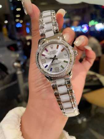 白 金 陶瓷20 劳力士精致品质最新首发细致腕美谐美不朽无暇挑剔细微悦尔 品牌 :劳力士 实物更美 值得推荐 类型 ：精致女款腕表 表带 ：间陶瓷表带 机芯 ： - 点击图像关闭