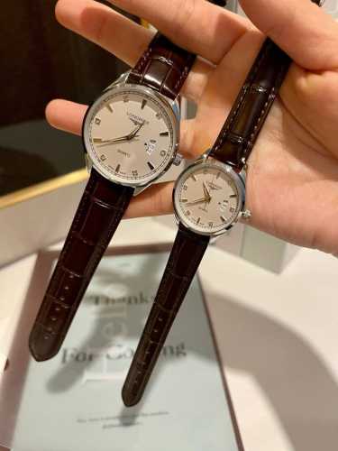 白皮 .金 .钢20 浪琴-Longines 情侣对表 原装进口石英机芯 316L精钢表壳 直径男39Mm女29Mm 厚8Mm如果今天的阳光停止了它耀眼的光芒。