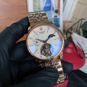 皮500 钢680品牌: 劳力士(飞轮新品，商务休闲）奢华大气类型：精品男士腕表（新品）表带：真牛皮表带(舒适)/316L精钢表带(耐用)机芯:高级机械机芯（稳