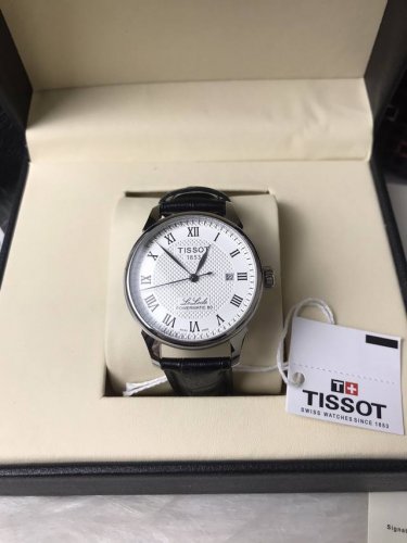 品牌：天梭-Tissot力洛克系列类型：男士腕表壳套：顶级版316精钢L表带：进口小牛皮表带316L精钢表带机芯：顶级自动机械镜面：矿物质防刮镜面玻璃尺寸：直径