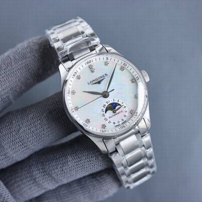 浪琴全新名匠男女款情侣系列L2.909.4简约优雅尽显从容气度 功能与原版同步 把头拨到第二档位可以独立快调月相独立快调日历功能，认准！ 表壳 腕表尺寸41X1