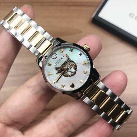 原盒:30 古驰g-Timeless 系列，表径27Mm，白色珍珠贝母表盘饰以品牌标志性动物图案，不绣钢间电pvd表带表壳，生活防水30M，现货 - 点击图像关闭