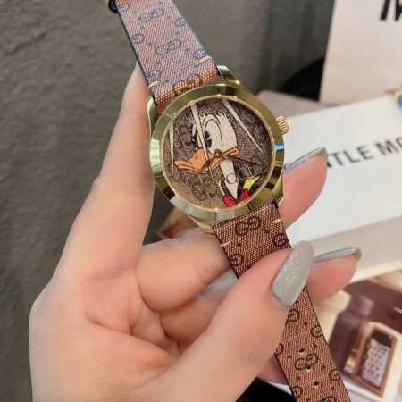 Gucci G-Timeless系列腕表 型号ya1264167每一季都会融入新颖别致的印花和图案，带来令人耳目一新的设计。具有传奇色彩的迪士尼动画角色为品牌最 - 点击图像关闭