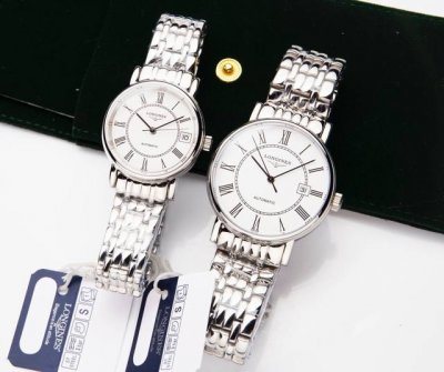 浪琴～亲民版瑰丽系列情侣对表 ，原装机芯，瑞士壳套做工，316精钢，原装扣 ，蓝宝石玻璃，三件套做工，男款直径39Mm，女款直径30Mm，做工较好 非普通国产机