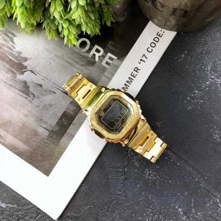 金色W-B5000D-1Jfb5000 35周年方带表 采用了极为用心的抛光和打磨，显得质感非常高级。经典的G-Sho壳形金属化之后，充满未来感和阳刚之气。配全 - 点击图像关闭