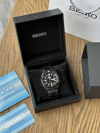 卡西欧Seiko 5运动迷笛黑色男士不锈钢表壳和手链自动机芯手表经典的外观与著名的精工完成。形式和功能与这款精工时计无缝结合。不锈钢表壳由黑色表盘和与之匹配的黑 - 点击图像关闭