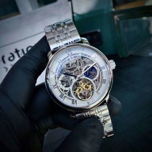 白 金 钢+20品牌: 江诗丹顿 飞轮新品，商务休闲 奢华大气类型：精品男士腕表 新品 表带：真牛皮表带 舒适 机芯:高级机械机芯 稳定 材料：矿物质防刮镜面
