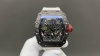 一体机芯 白宝石避震 Richard Mille 理查米尔Rm 35-02 这是该系列第一枚搭载自动上链机芯的作品 并且别出心裁地使用全碳纤维材料来制作整个表壳