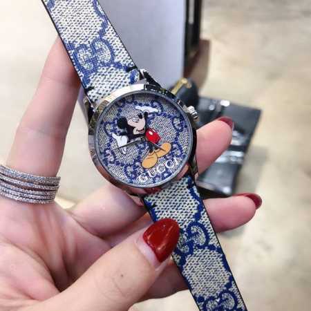 Gucci 古驰 2020×Disney最新联名限定款以米奇为主题限量发售，表盘饰以趣味盎然的米奇图案，丰富形式精彩呈现这位动画角色。进口石英机芯，直径38Mm - 点击图像关闭