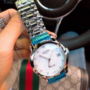 情侣 浪琴 进口石英机芯 走时超级准 贝壳表面带日历 男女都有的